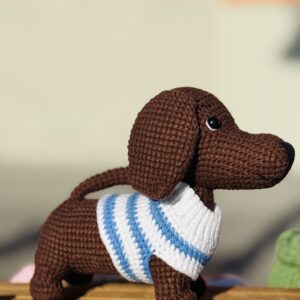 crocheted brown dachshund dog with blue striped sweater handmade plush toy