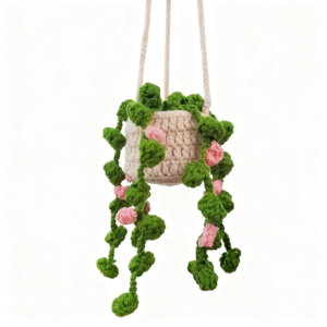 handmade crochet hanging plant basket with pink and green vines
